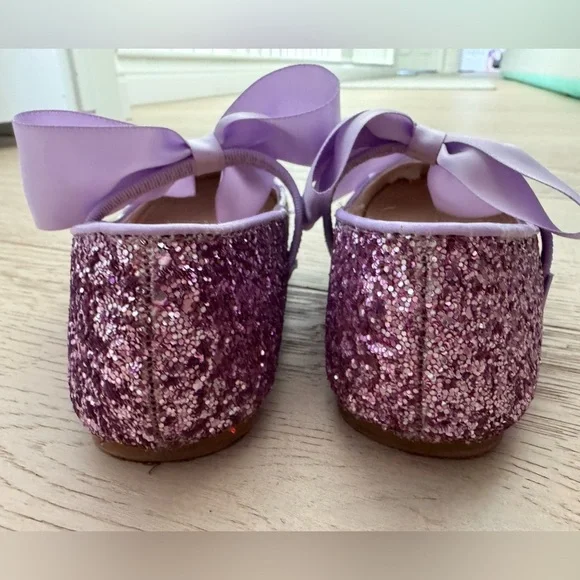 Kailee P. 
Girls Rock Glitter Mary Jane Ballet Flats with Satin Bow
Size 11 - Picture 5 of 8